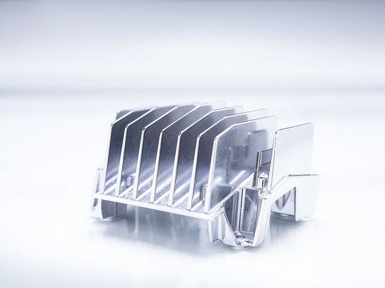 Cooling fins after edge rounding with mass finishing systems
